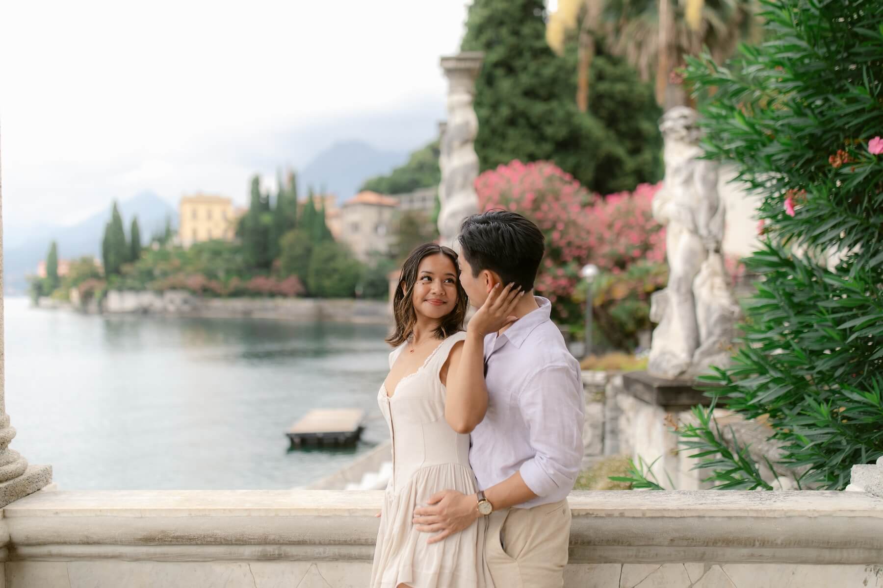 a couple looking at each other on a couple photoshoot with Flytographer in Lake Como