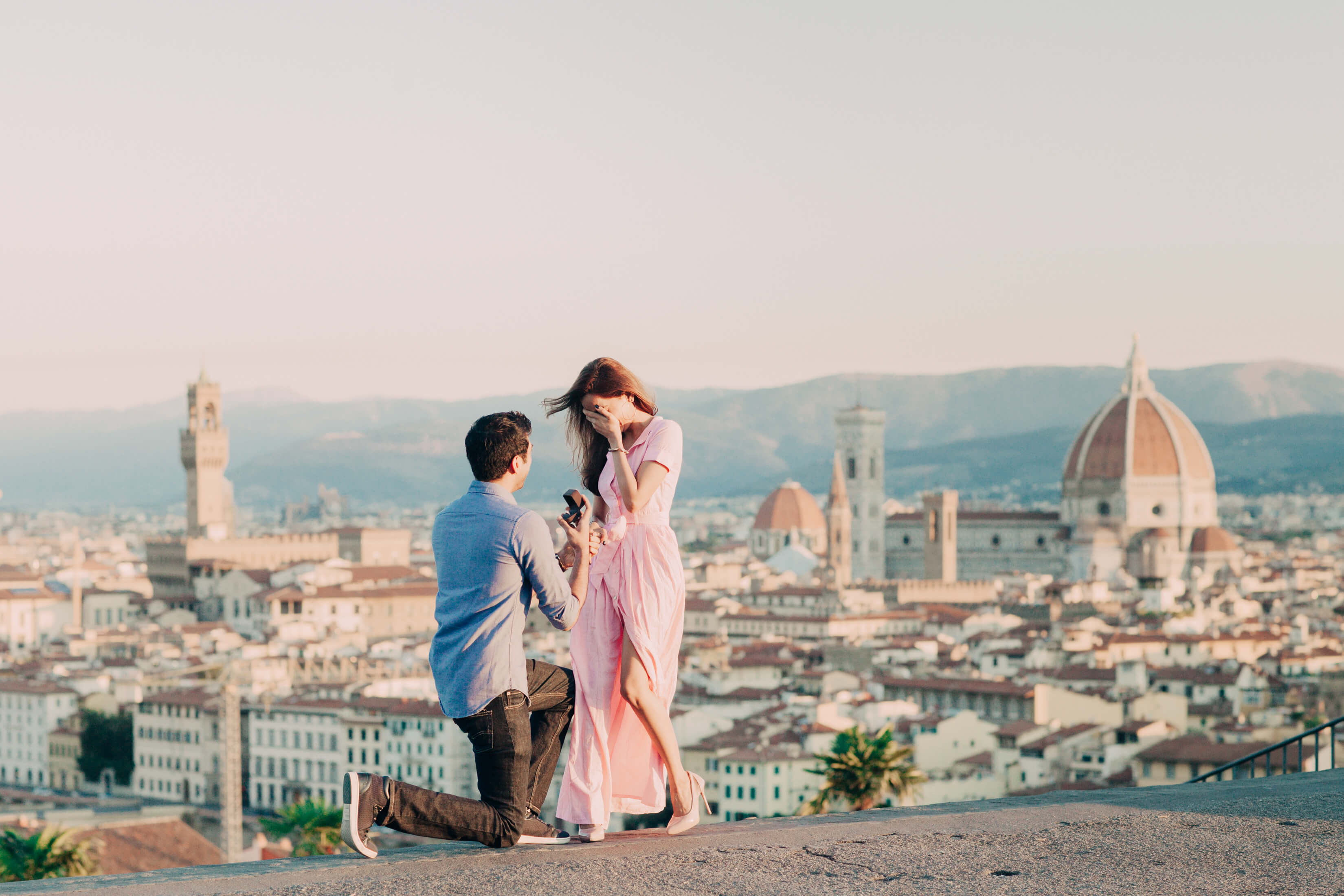 Man kneeling during Florence surprise proposal photo session